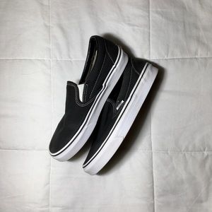 black and white slip on vans